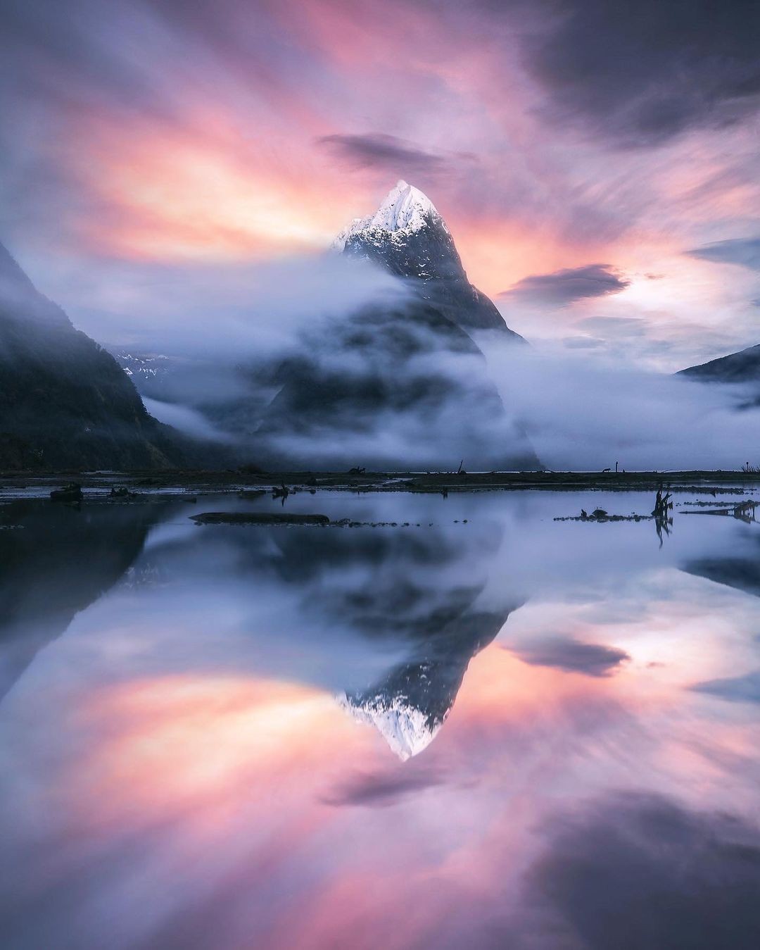 Mitre Peak reflections in Milford Sound, New Zealand.