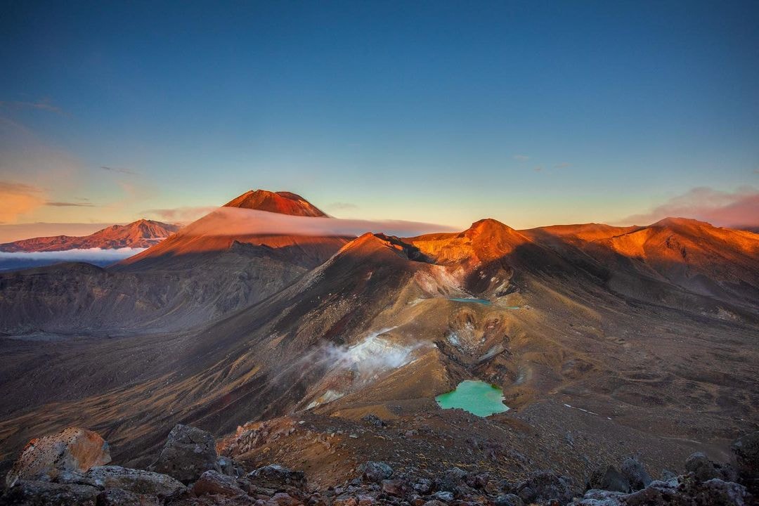 The famous blue lake of the Tongariro National Park captured at sunrise.