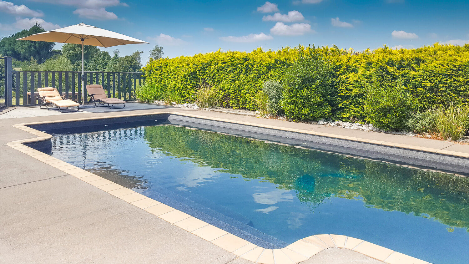 A large lap pool at MountViews Glamping in Taupo, New Zealand.