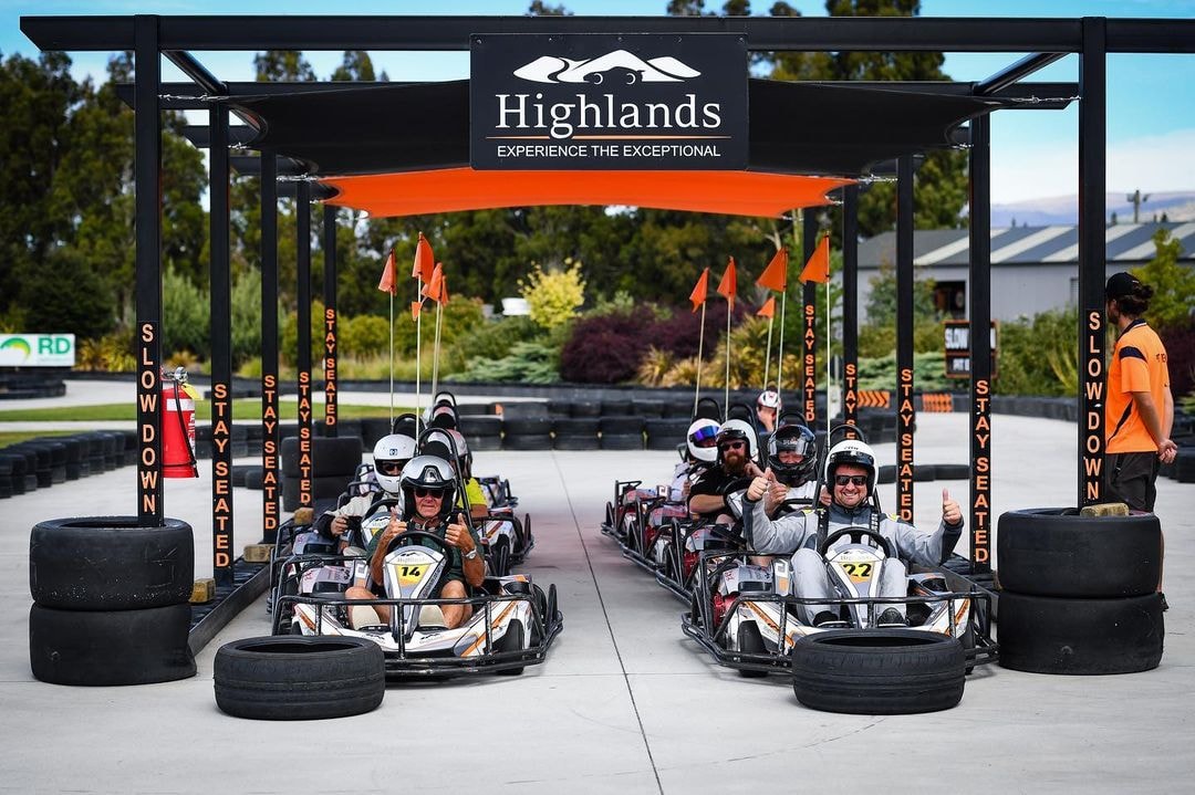 A group of racers sit in their Go Karts ready to drive at the Highlands Motorsport Park in Cromwell.