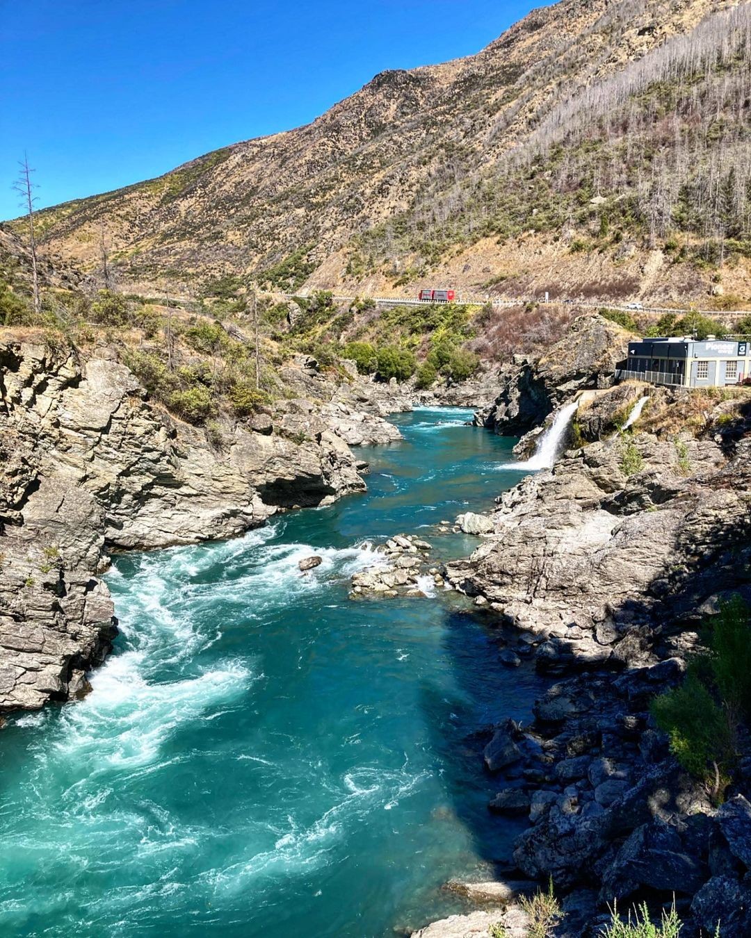 The Kawarau River rages past the Roaring Meg hydro electricity station in the Cromwell Gorge.