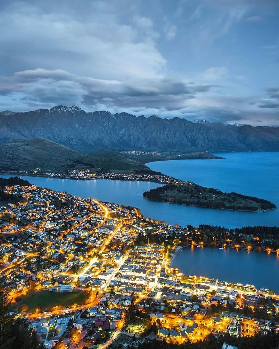 The stunning nightscape of Queenstown as seen from Skyline Queenstown's viewing deck.