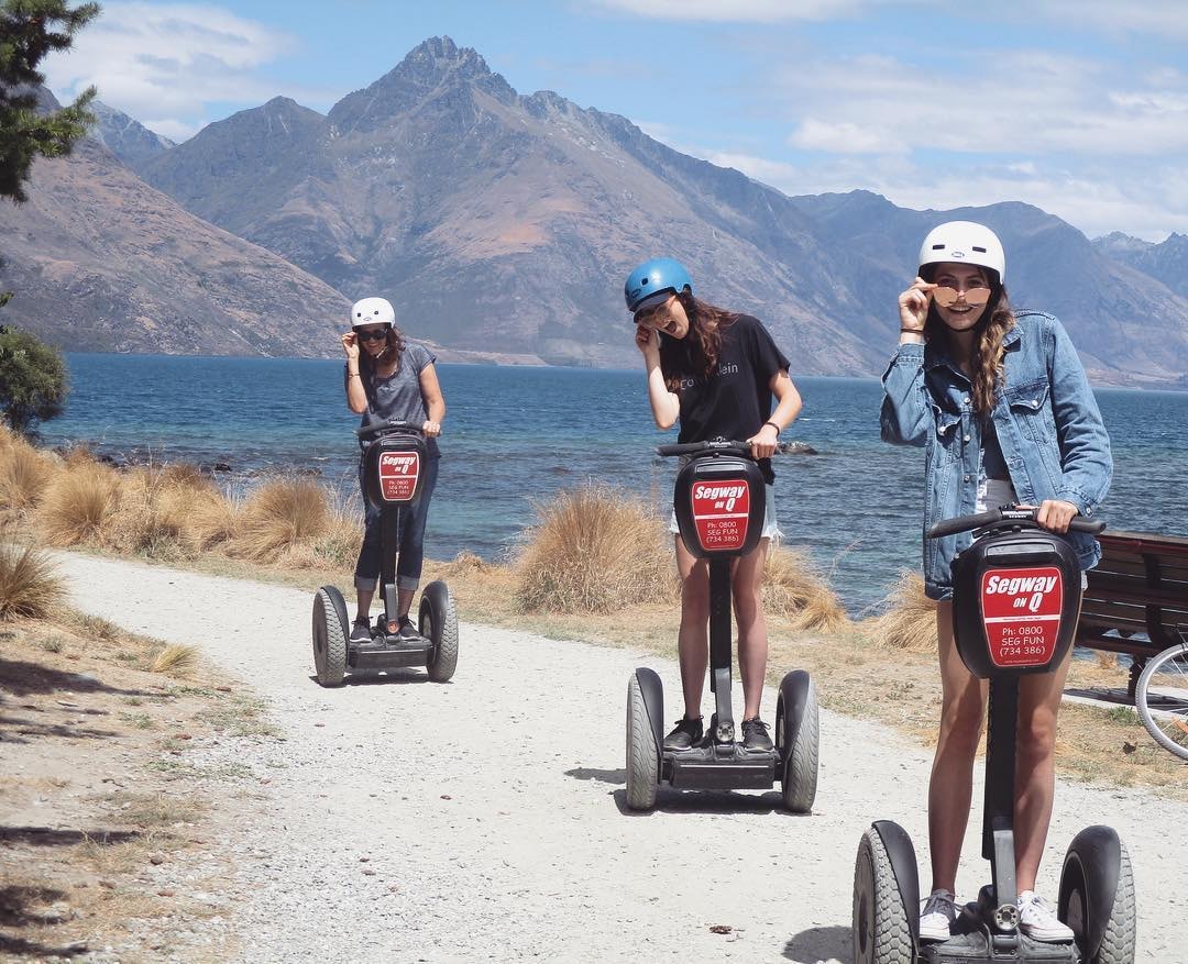 Three woman enjoy a Segway experience around the shores of Lake Whakatipu.