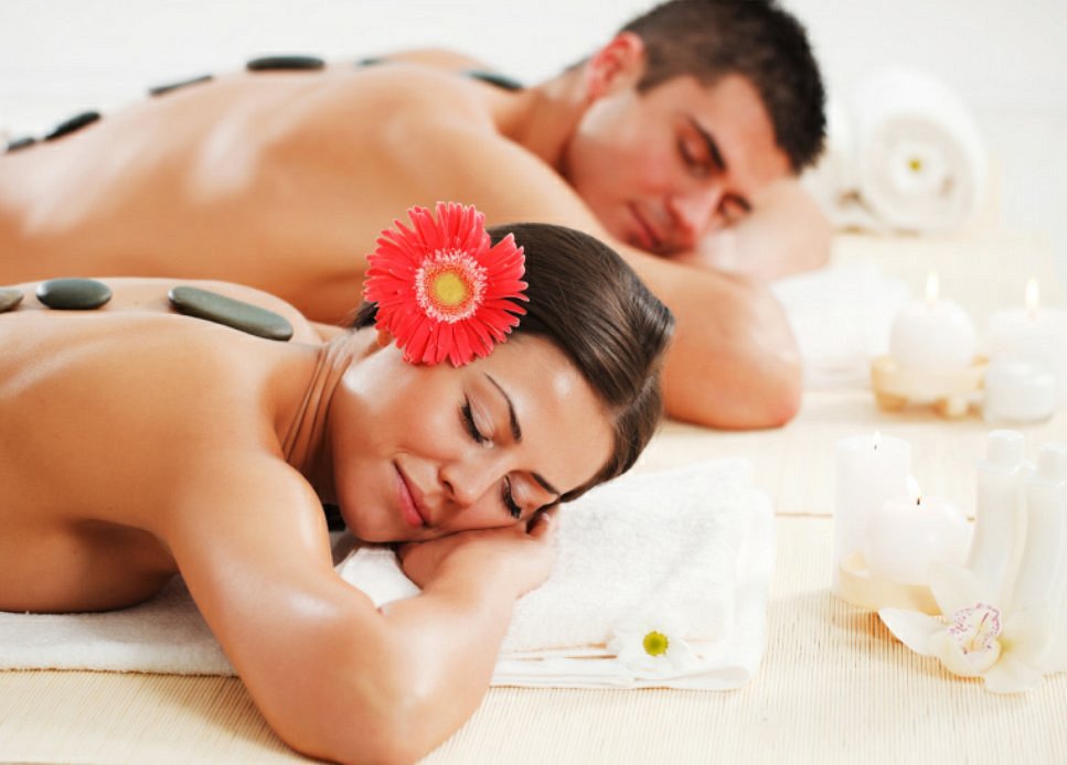 A couple receive a hot stone massage at BodyFix Massage & Spa Therapies in Rotorua.