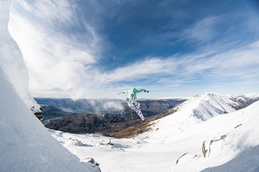 A skier gets some air on an off-piste run at Treble Cone in Wanaka, New Zealand.