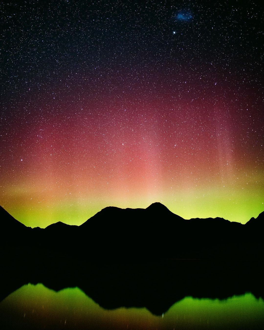 The Aurora Australis putting on a spectacular light show at Moke Lake in Queenstown, New Zealand.