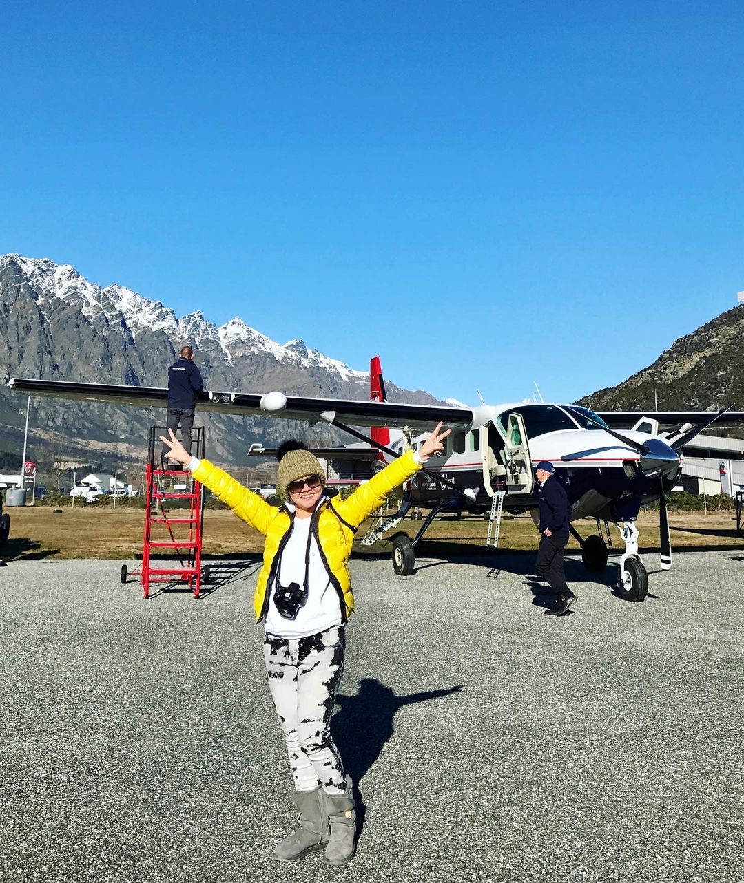 Excited person about to take a scenic flight over Queenstown.