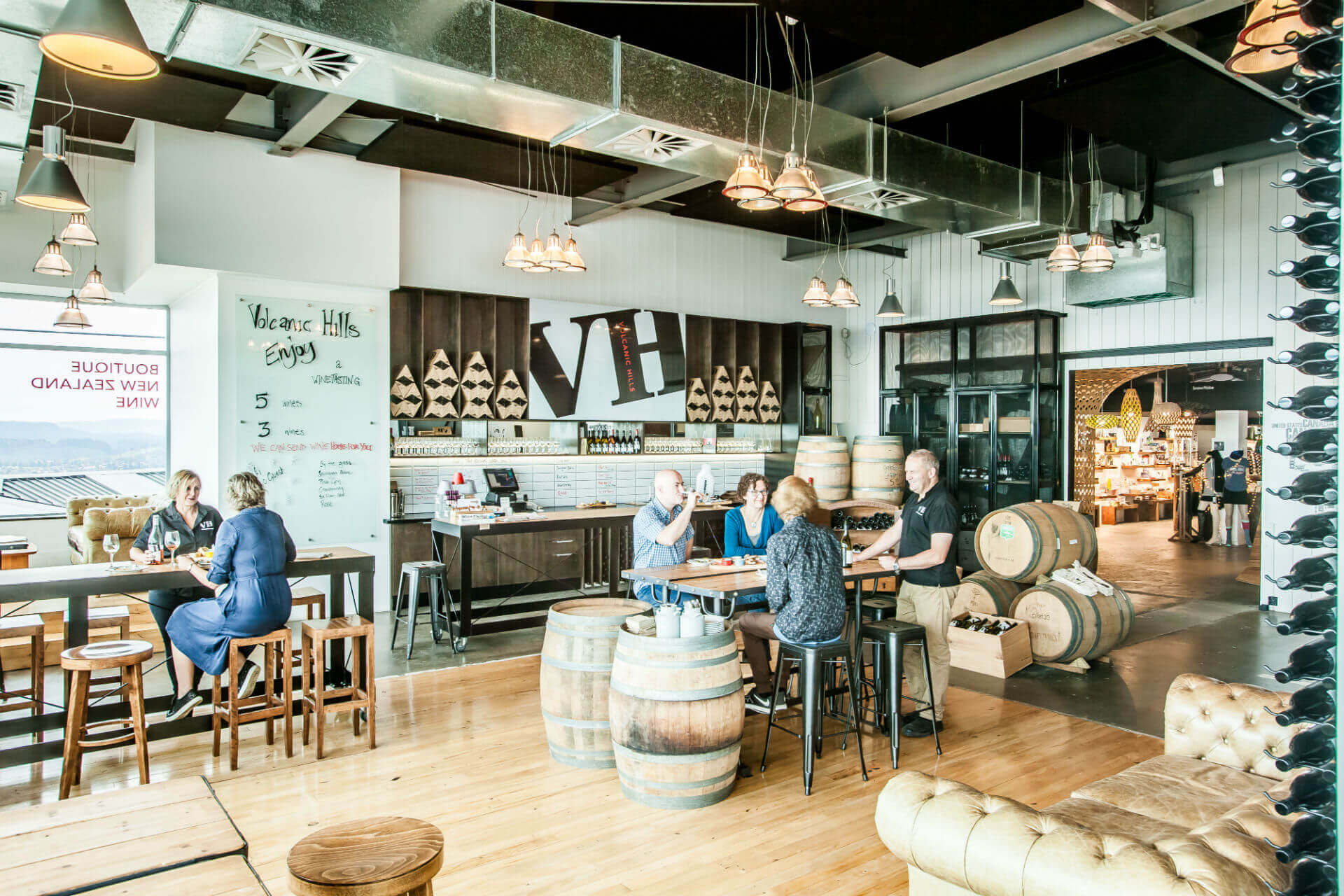 Customer Enjoying a wine tasting at Volcanic Hills Tasting Room.