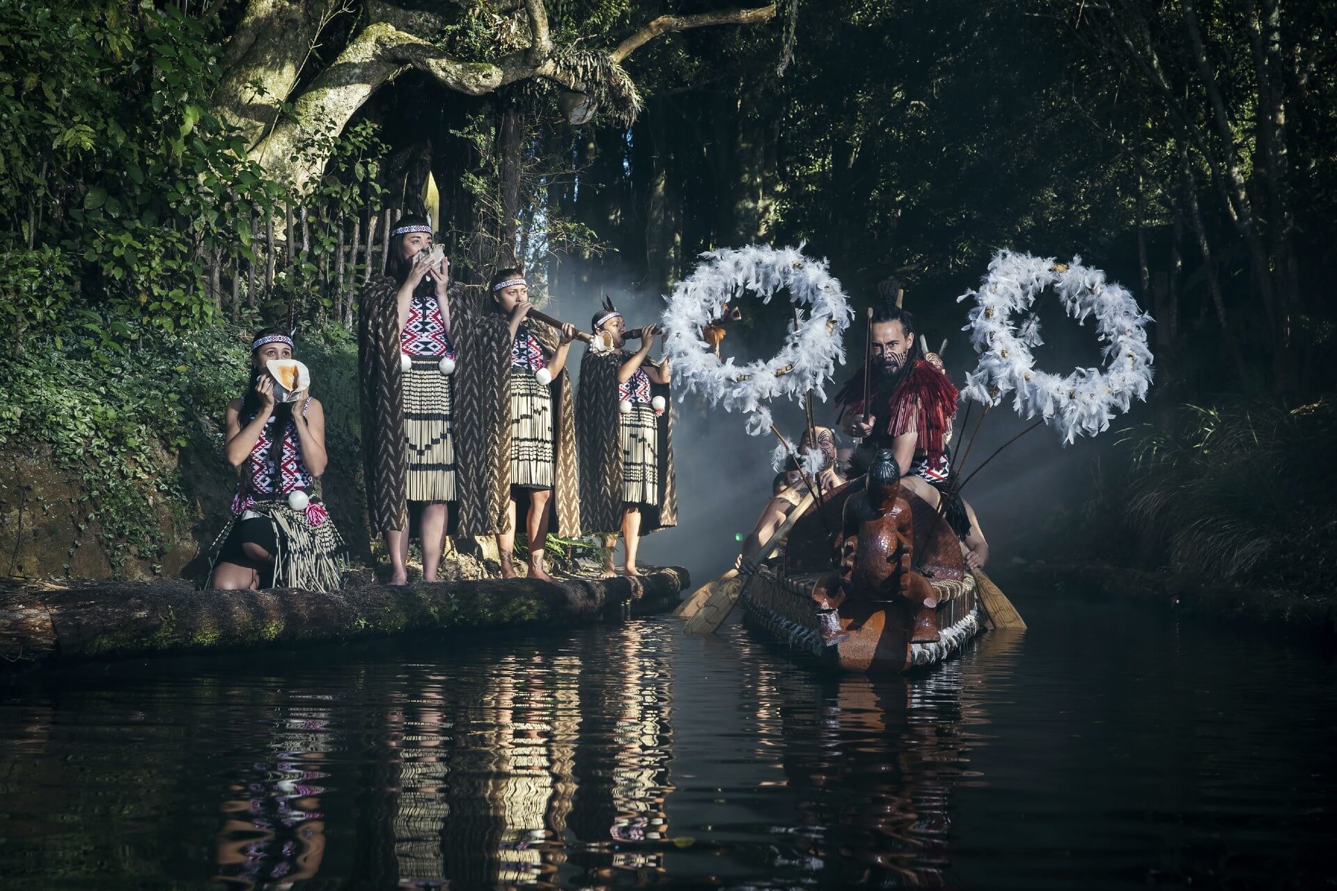 A group of Māori warriors re-enact tribal greetings at the Tamaki Māori Village.