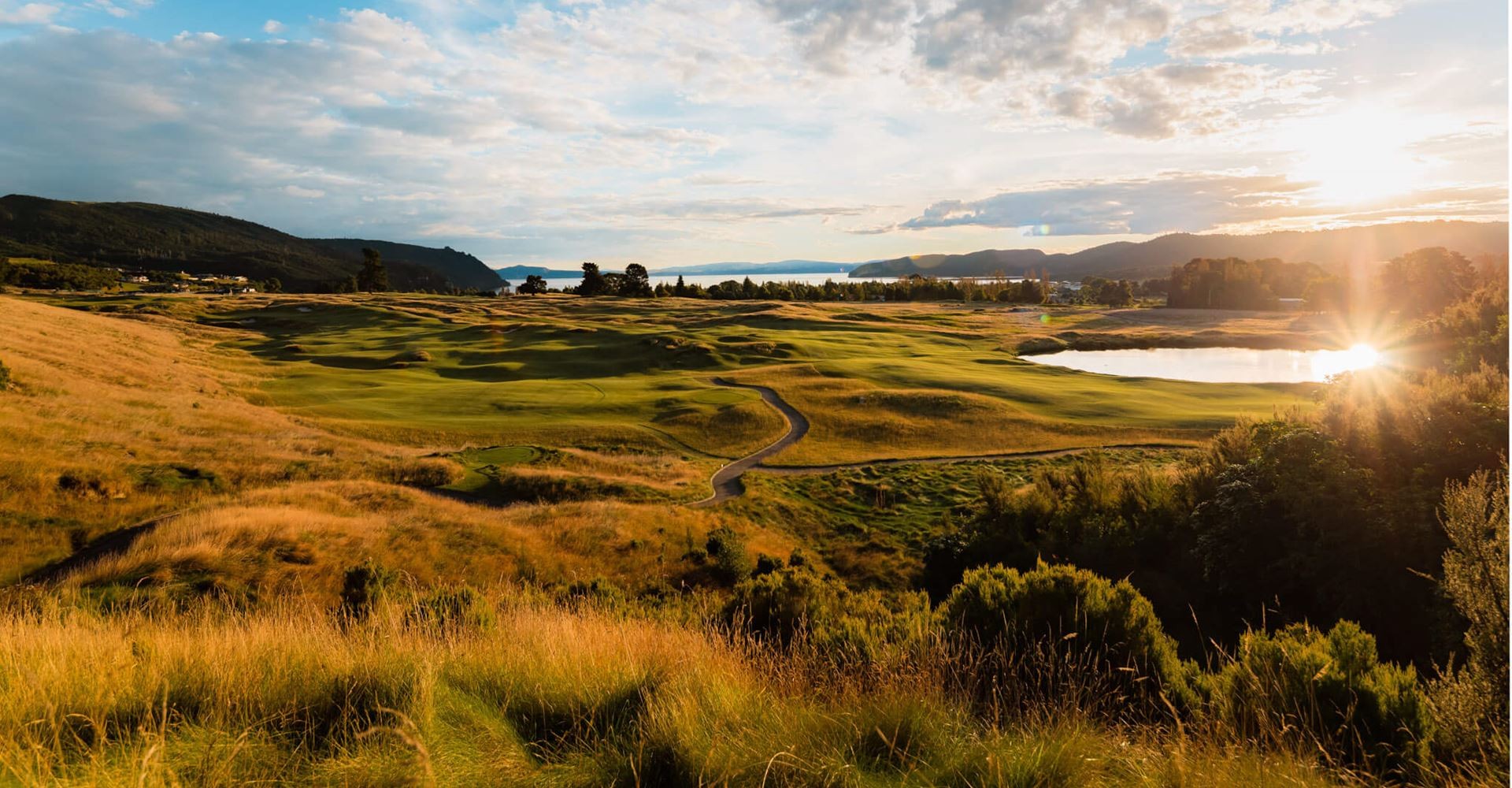 Sweeping views of undulating landscaped greens and small ponds at The Kinloch Golf Club.
