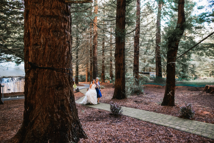 A Bride Is Walked Down The Aisle By A Close Friend To Be Married.