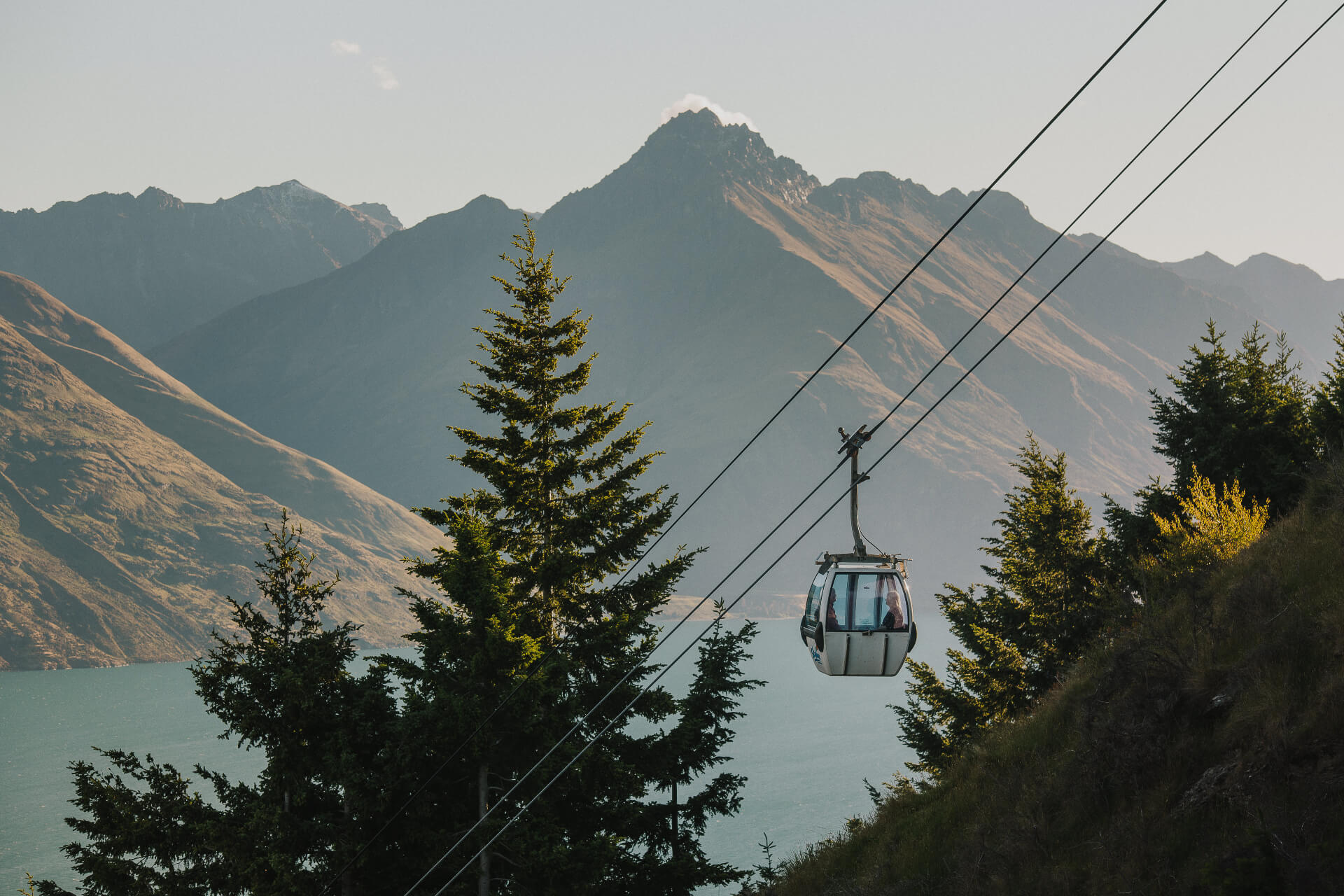 A lone Gondola riding up to Skyline Queenstown.