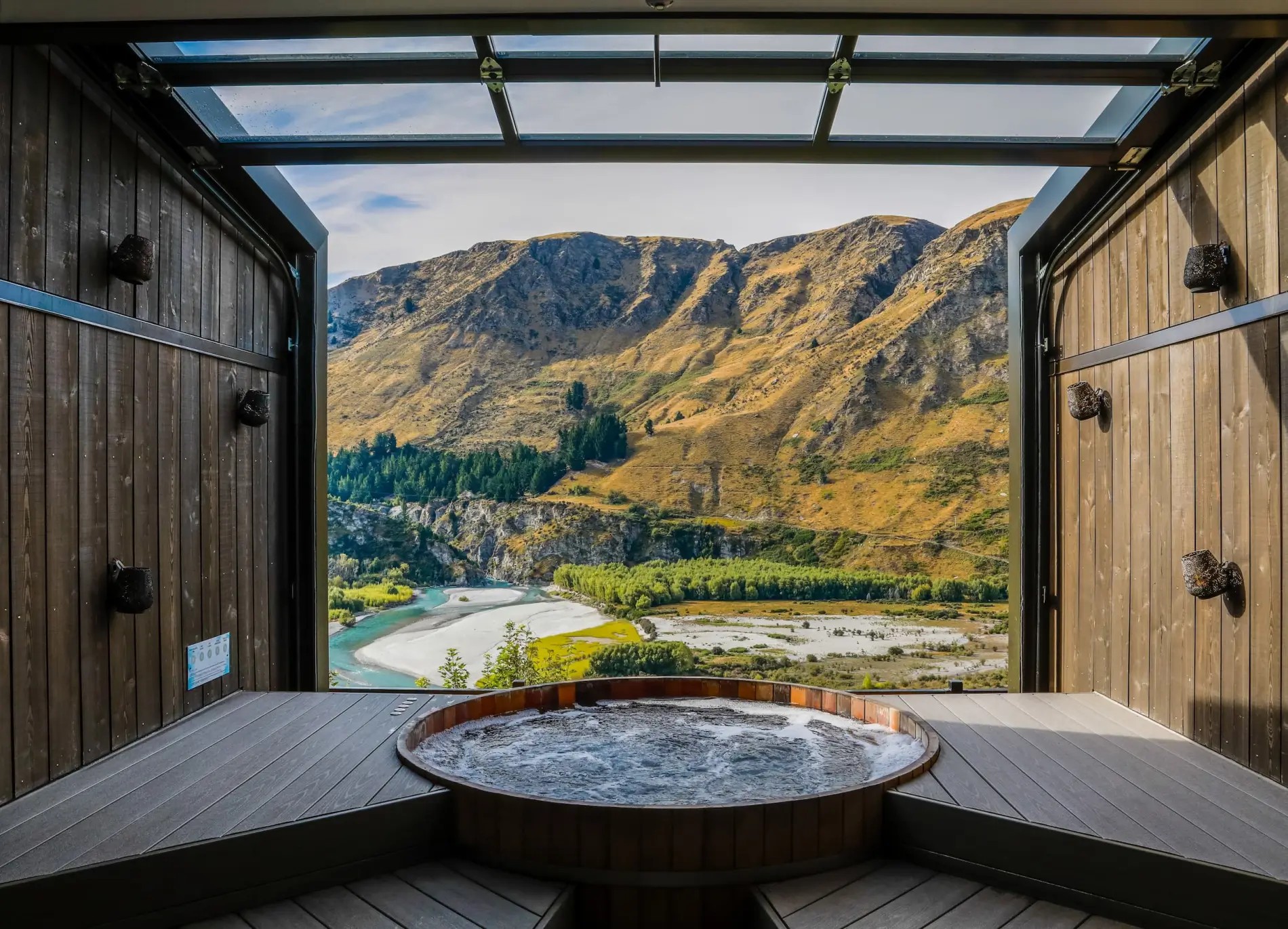 View of the Shotover River and surrounding mountains from Onsen Hot Pools in Queenstown.