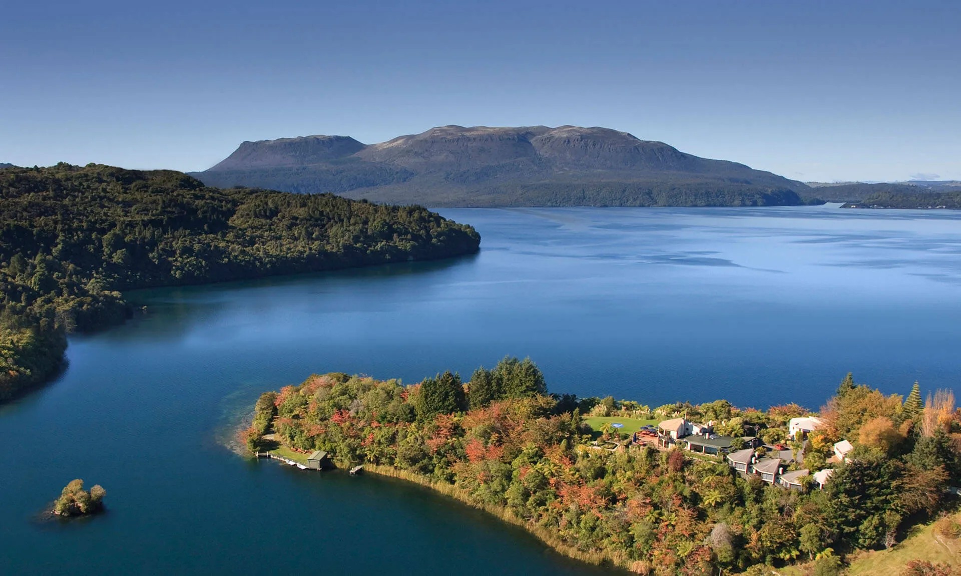 Aerial view of Solitaire Lodge on the shore of Lake Tarawera.