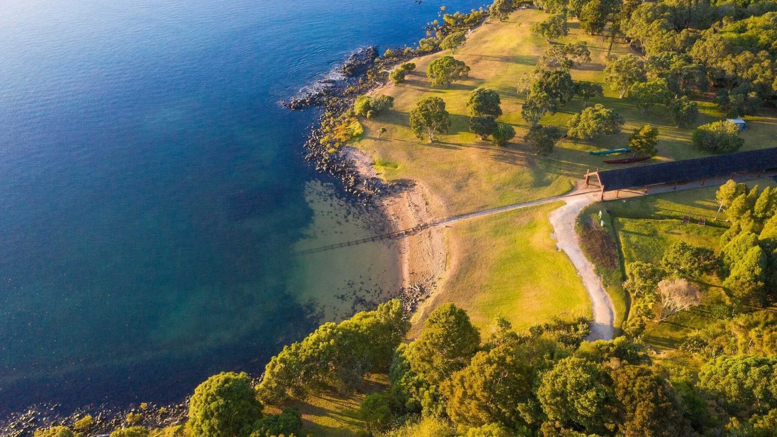 Overhead view of the Waitangi Treaty Grounds and surrounding sea.