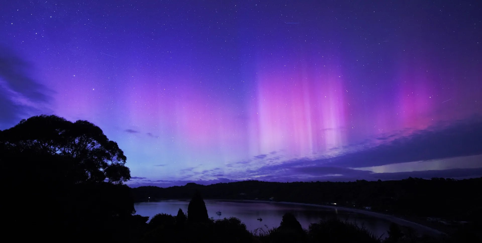 Purple-pink Southern Lights lighting up the sky.