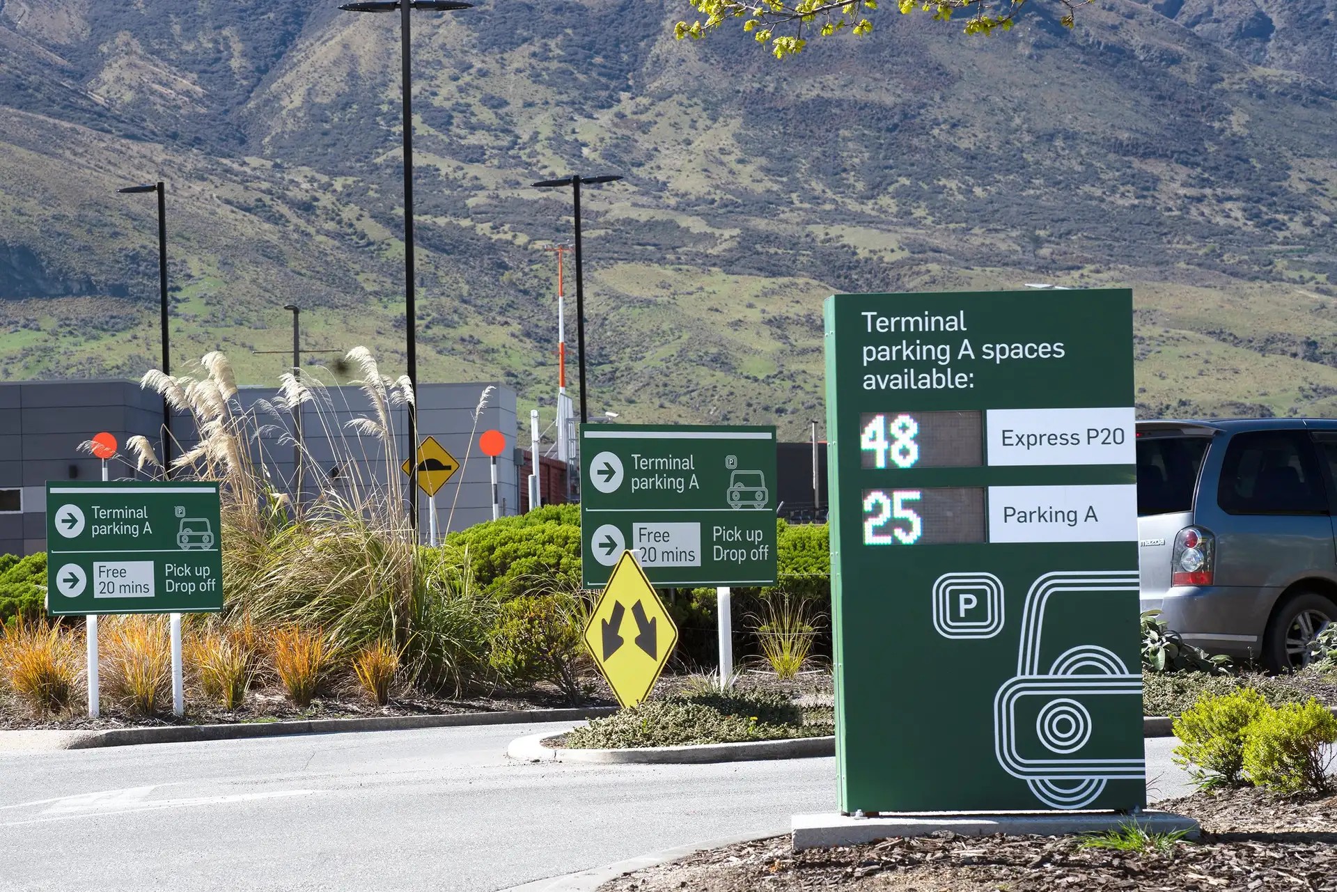 QT Airport terminal A parking entrance with signage.