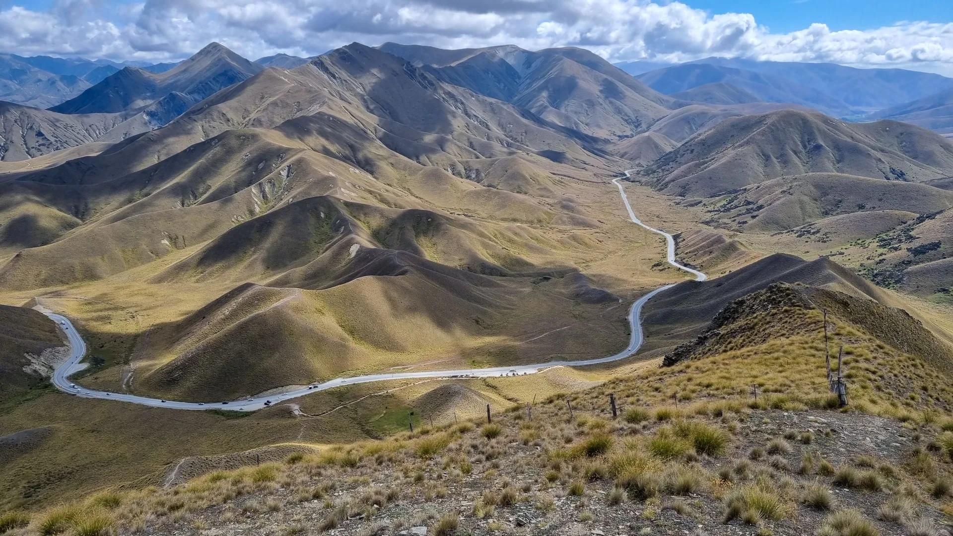 Mountain pass covered in tussock.