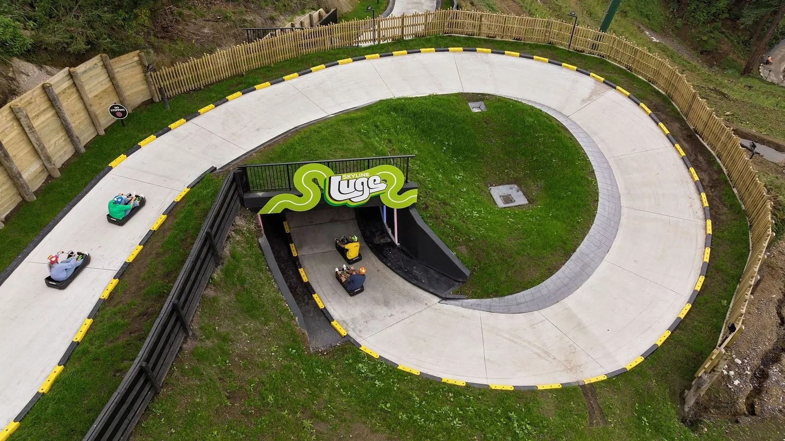 Overhead view of a spiral-shaped Luge track.