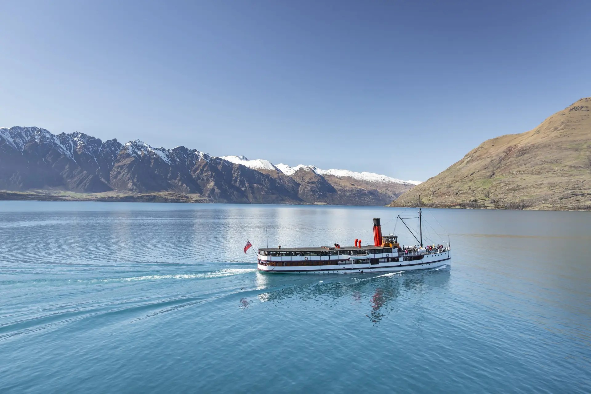 Small ferry crossing Lake Wakatipu.