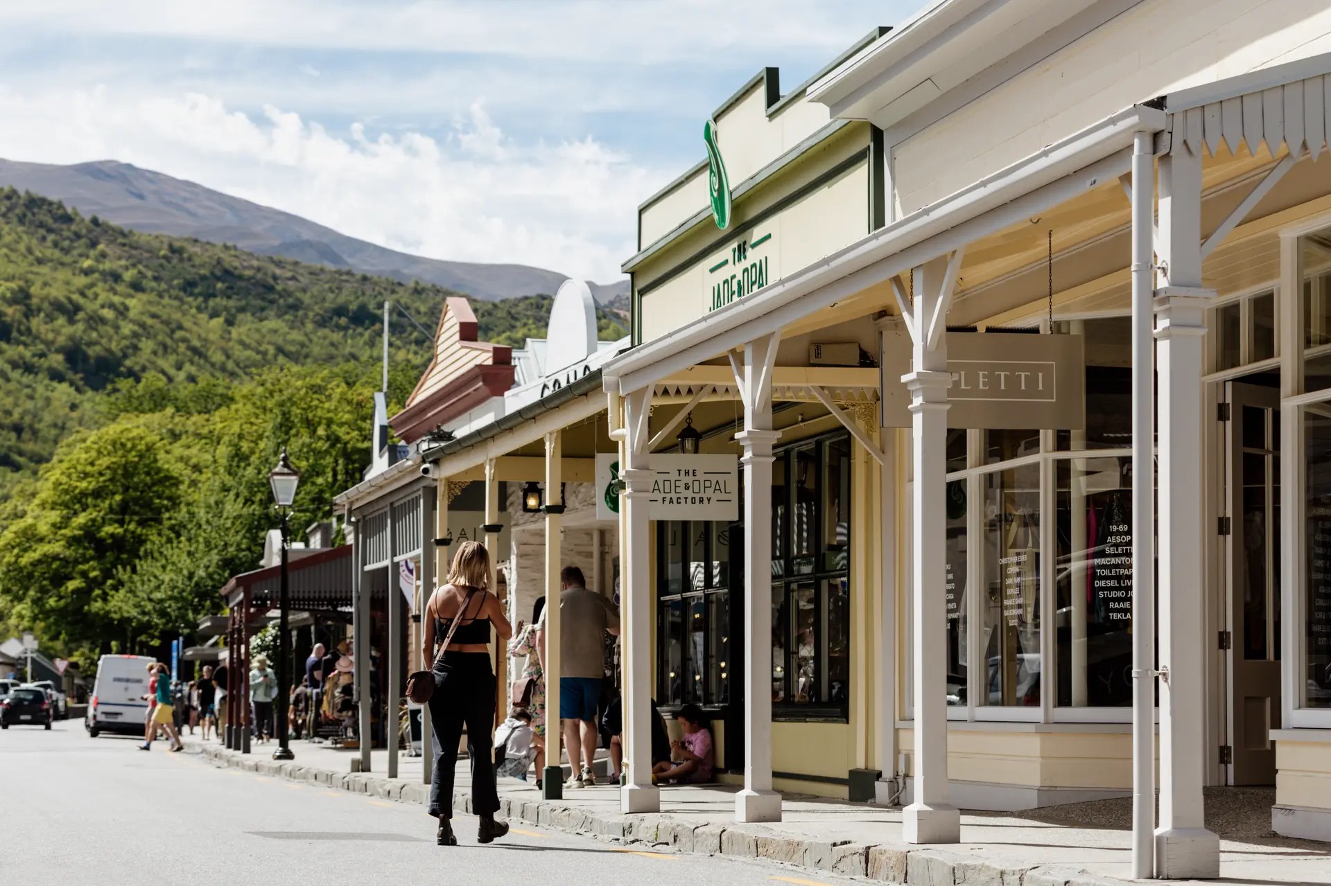 Arrowtown main street with shops in historical buildings.