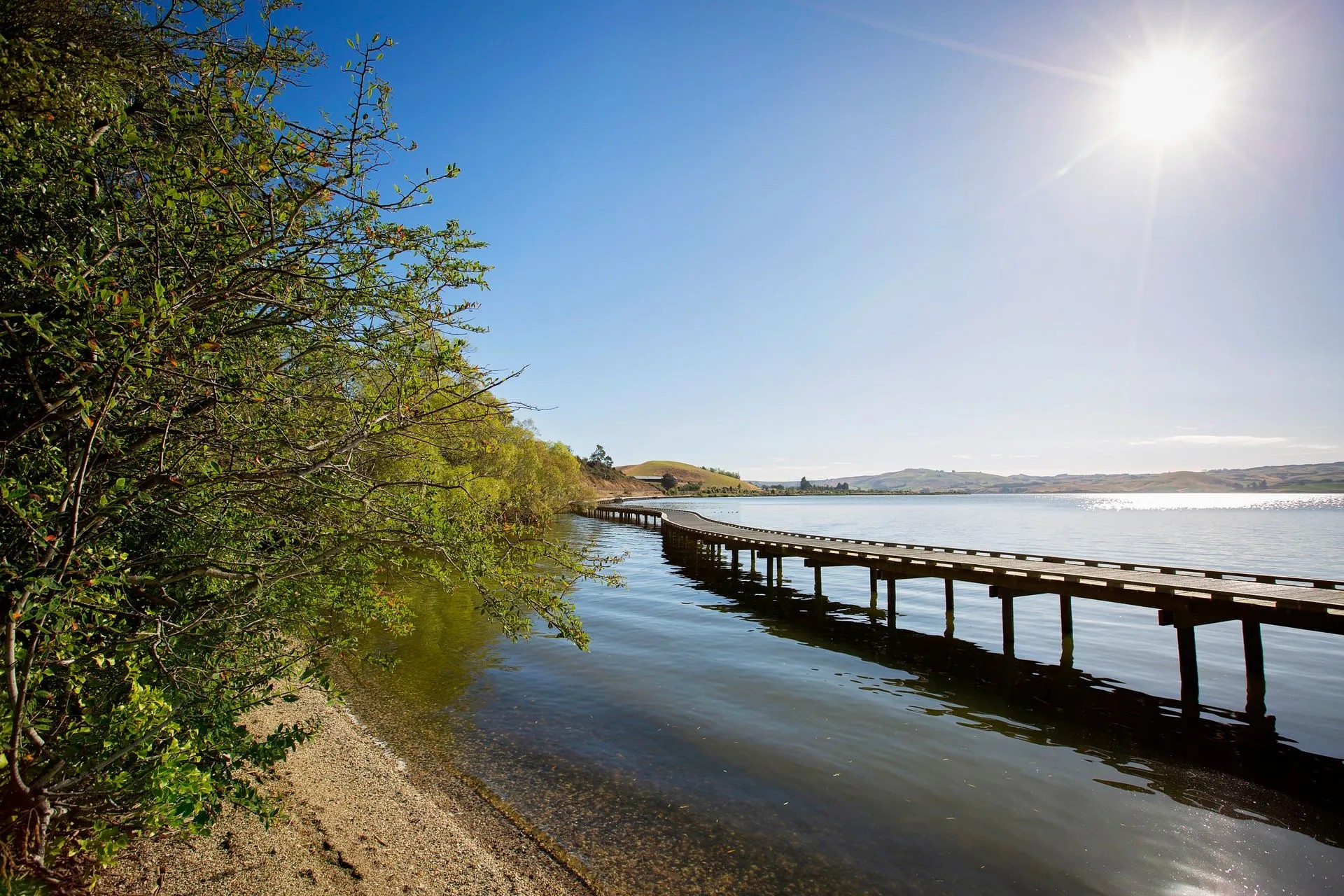 A lake with a raised boardwalk